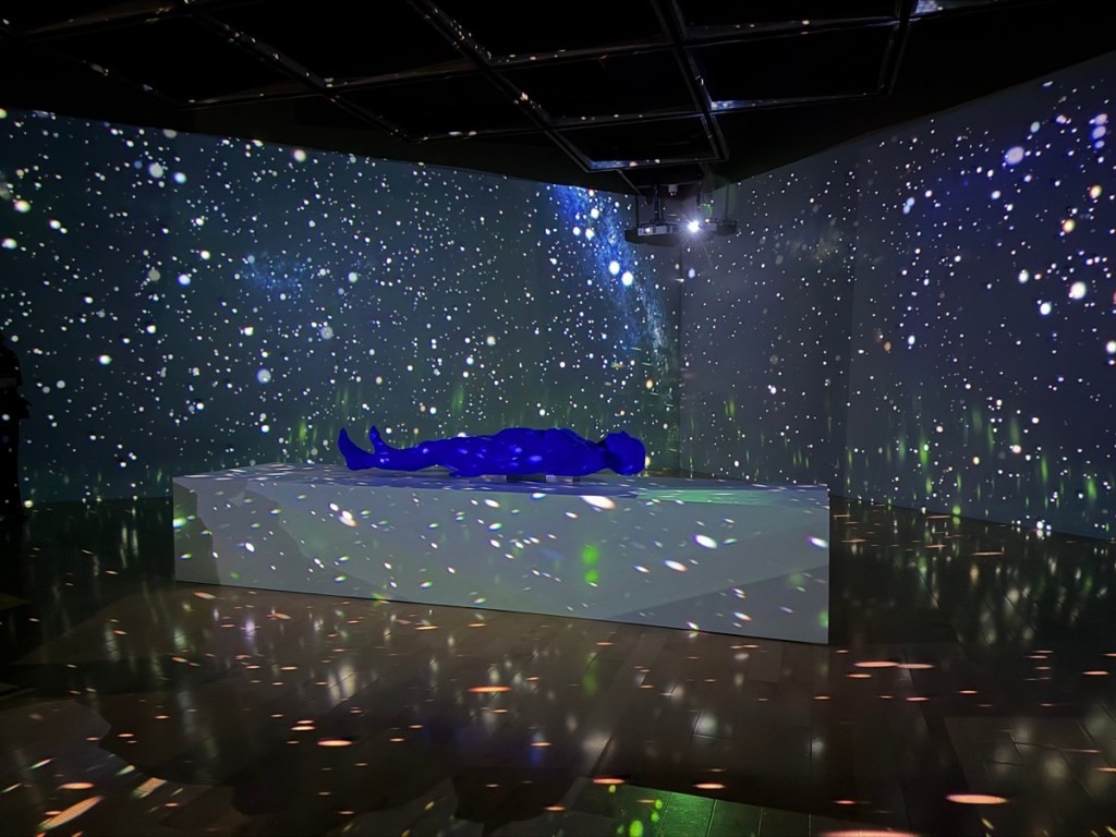 A blue figure in the Palm Springs Art Museum as part of the exhibit