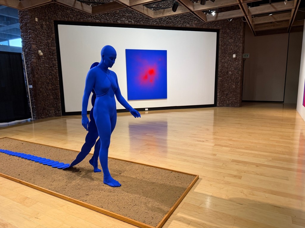 A blue figure in the Palm Springs Art Museum as part of the exhibit