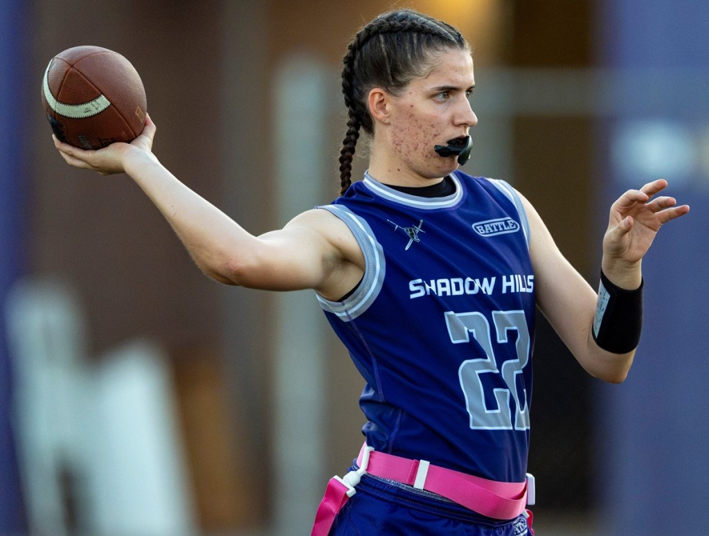 Vanessa Monaco throws a pass