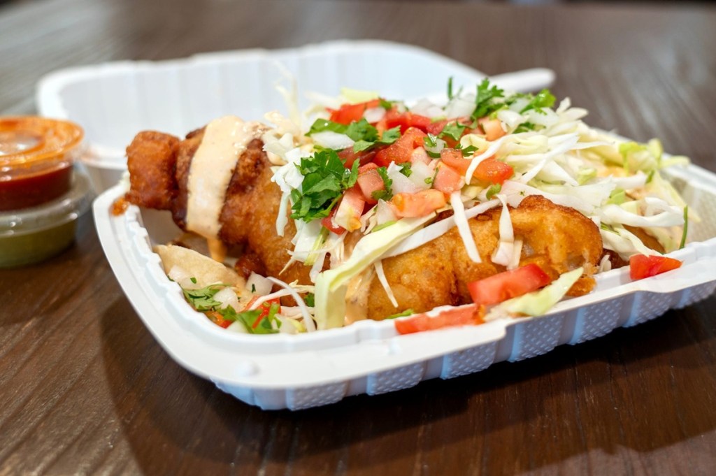 Menu item from a taco spot in Palm Springs in a to-go box